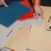 office worker picking up file folders