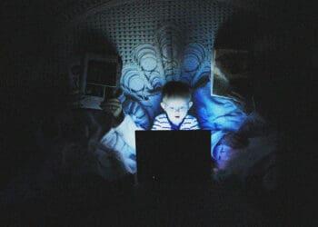 small child using computer