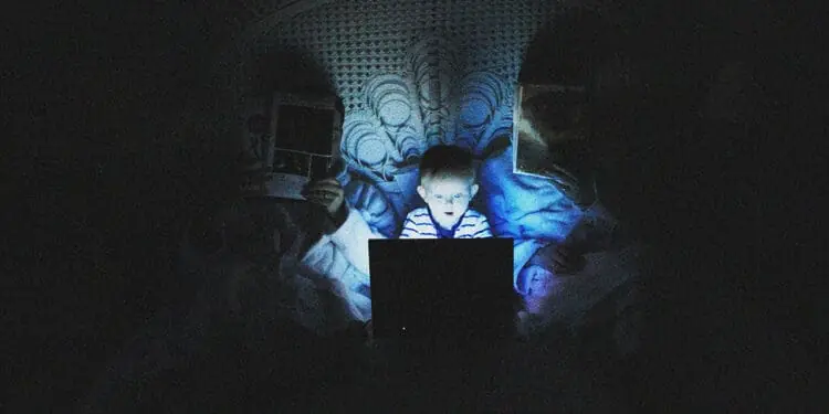 small child using computer