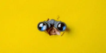 binoculars peeking through screen