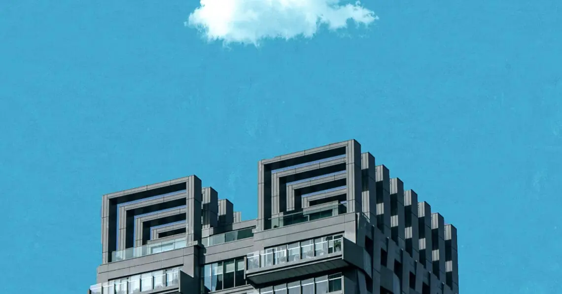 cloud over skyscraper