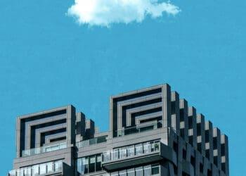 cloud over skyscraper