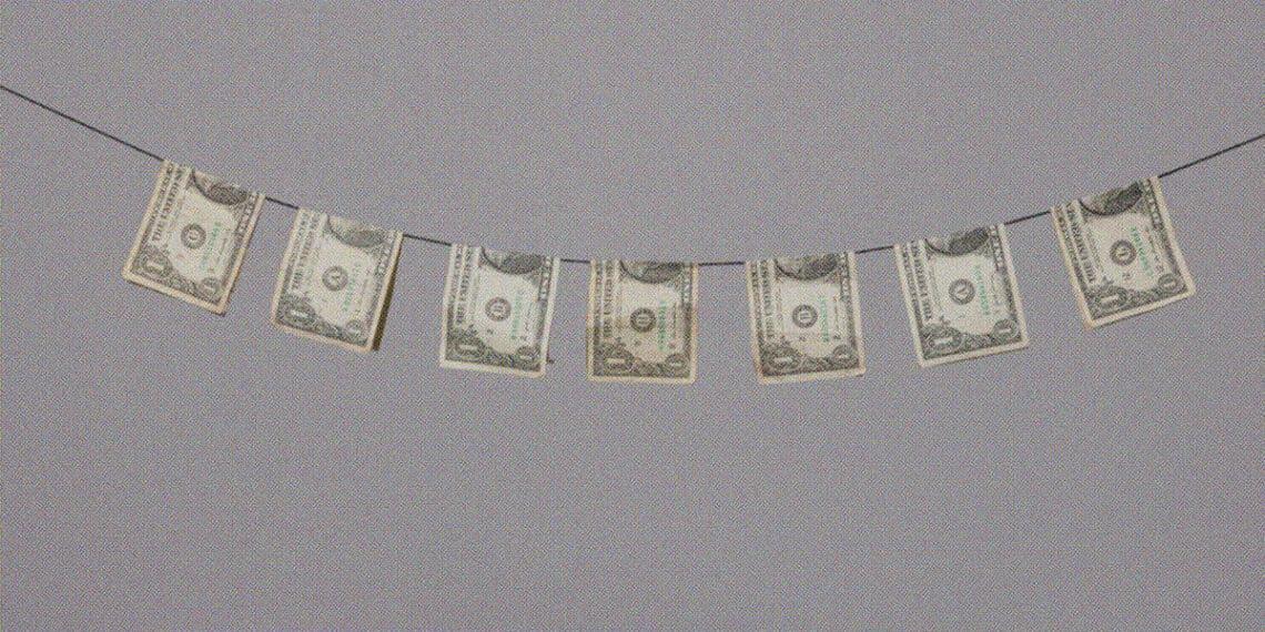 dollar bills on clothesline