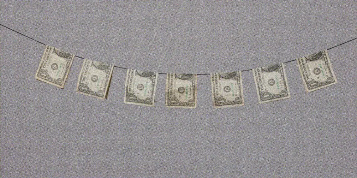 dollar bills on clothesline