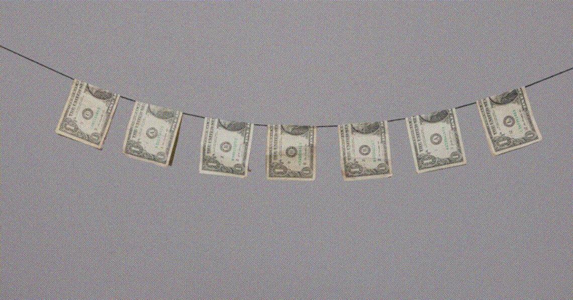 dollar bills on clothesline