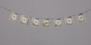 dollar bills on clothesline