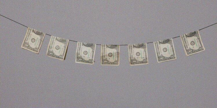 dollar bills on clothesline