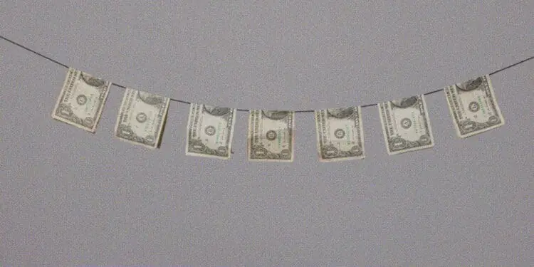 dollar bills on clothesline