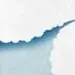 paper airplane cutting through clouds