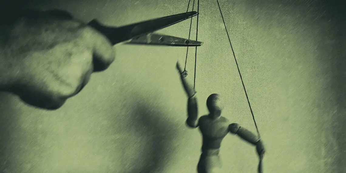 puppet with strings cut