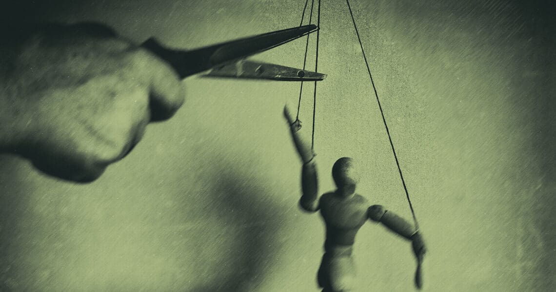 puppet with strings cut