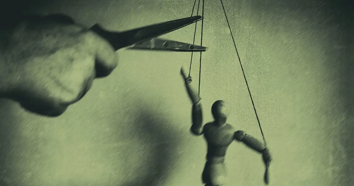 puppet with strings cut