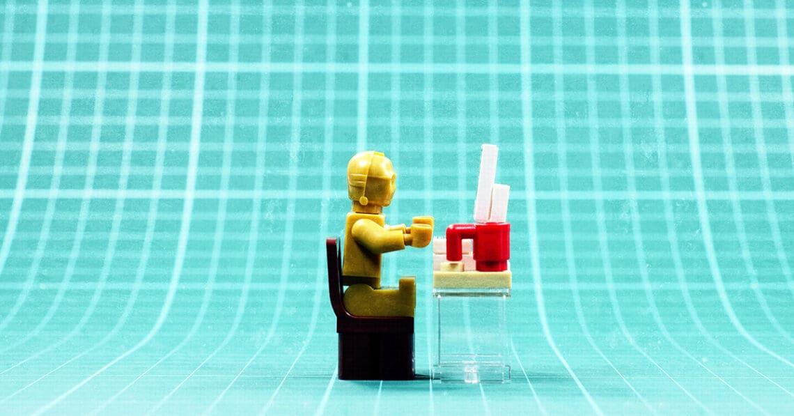 c3po working at a desk