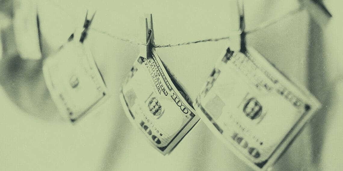 bills on clothesline money laundering