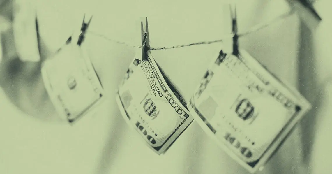 bills on clothesline money laundering