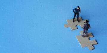 merger concept figurines