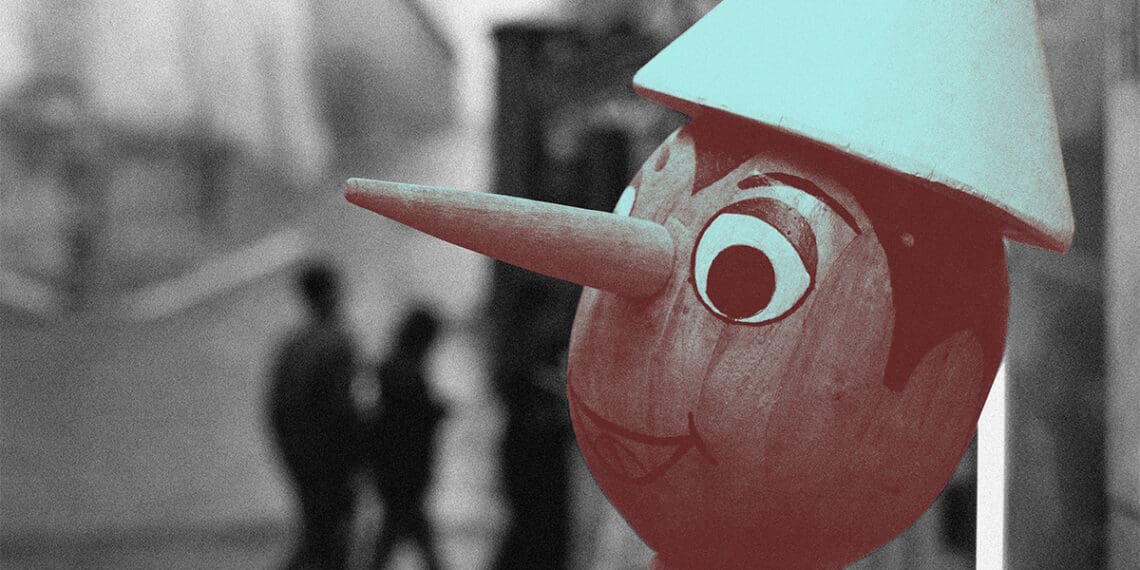 pinocchio doll lying long nose