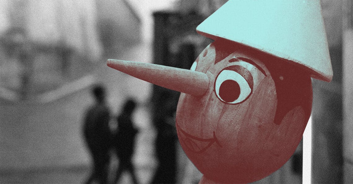 pinocchio doll lying long nose