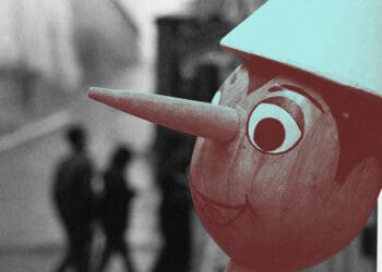 pinocchio doll lying long nose