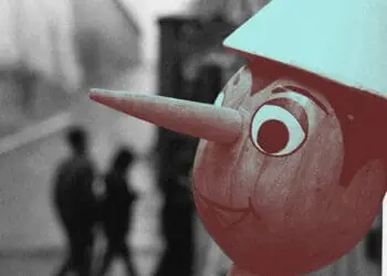 pinocchio doll lying long nose