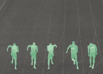 green sprint racers on a track