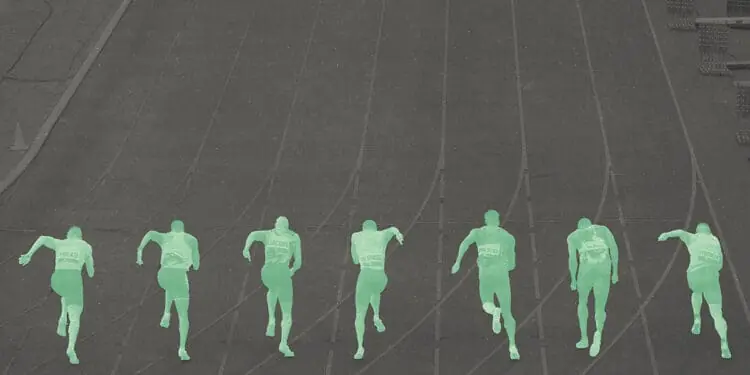 green sprint racers on a track