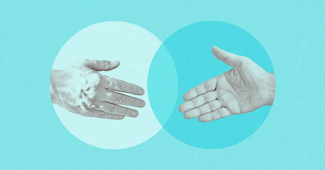 hands shaking merger concept