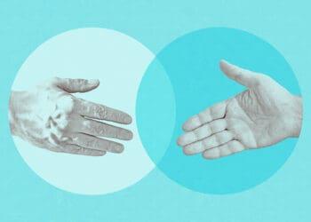 hands shaking merger concept