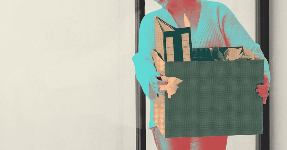 layoffs woman with carton of items