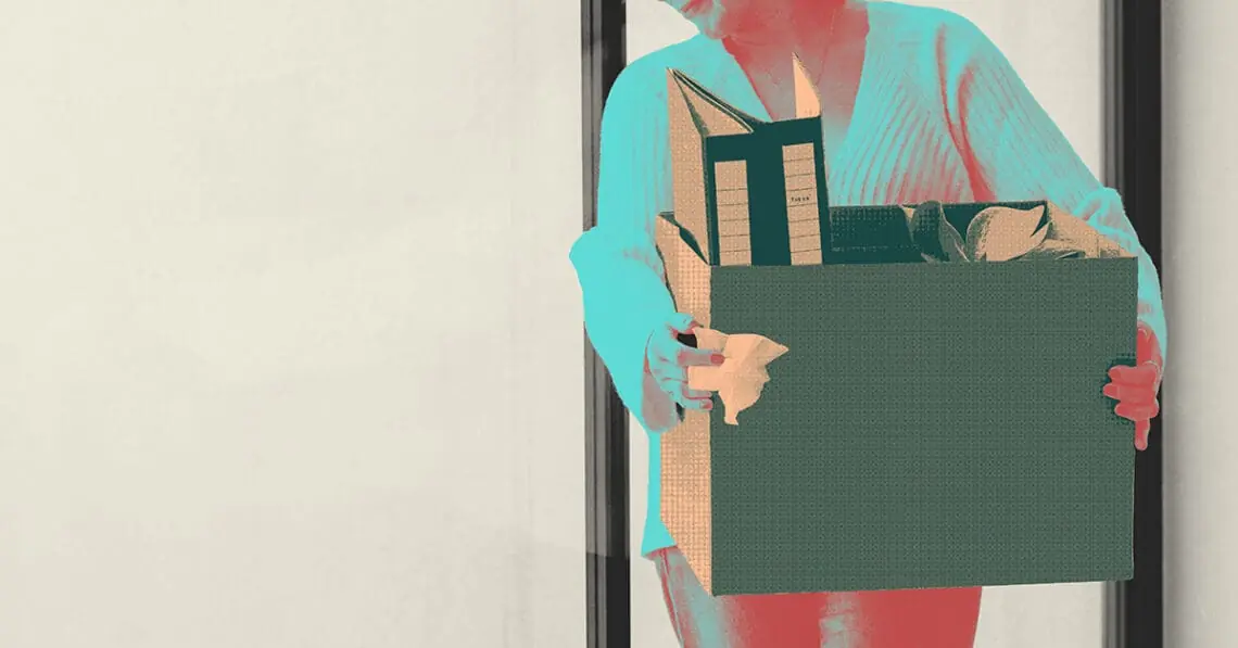 layoffs woman with carton of items
