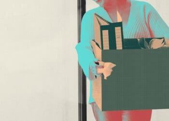 layoffs woman with carton of items