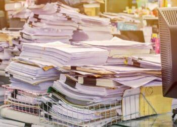 overwhelming stacks of documents