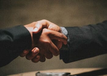 business handshake outsourcing concept