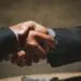 business handshake outsourcing concept