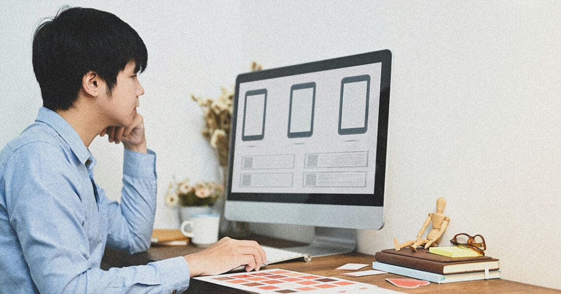 graphic designer creating mobile app interface