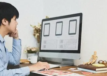 graphic designer creating mobile app interface