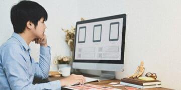 graphic designer creating mobile app interface