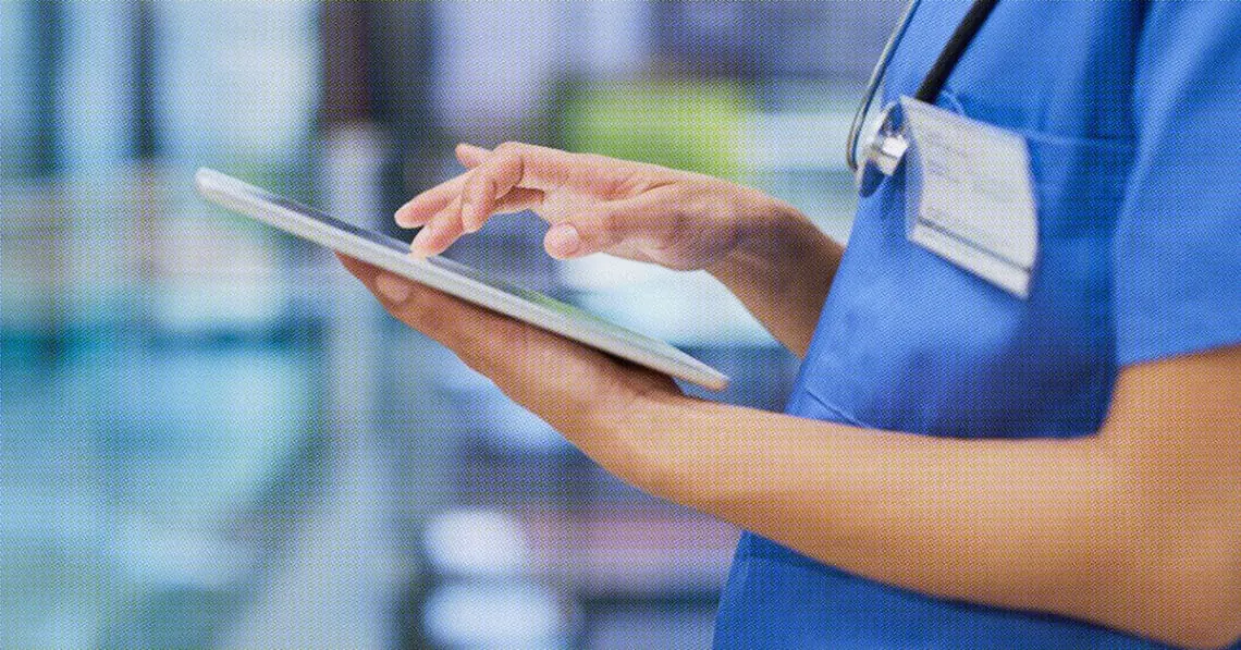 nurse holding chart