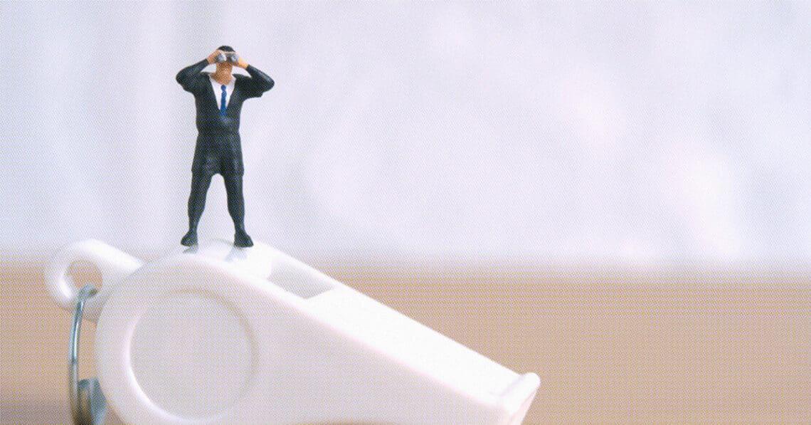 whistleblower figurine business leader