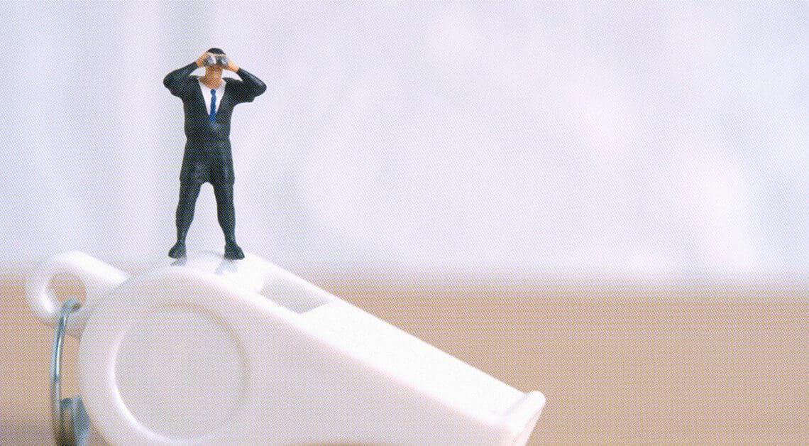 whistleblower figurine business leader