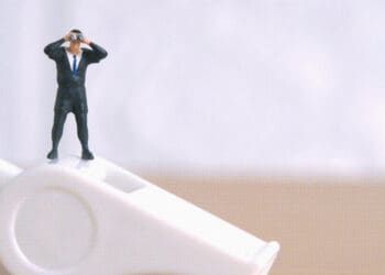 whistleblower figurine business leader