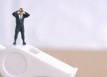 whistleblower figurine business leader
