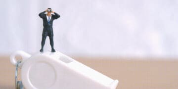 whistleblower figurine business leader