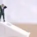 whistleblower figurine business leader