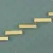 5 wooden steps on a wall