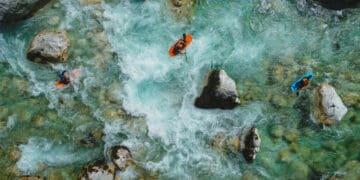 kayakers navigating treacherous waters