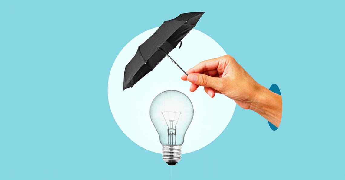 umbrella over lightbulb protecting IP concept