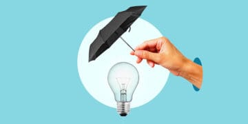 umbrella over lightbulb protecting IP concept