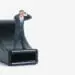 businessman figurine on whistle whistleblowing concept