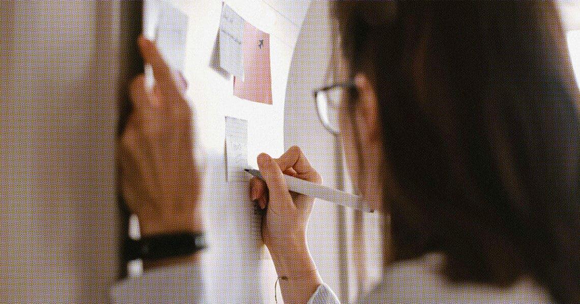 executive planning on wall calendar